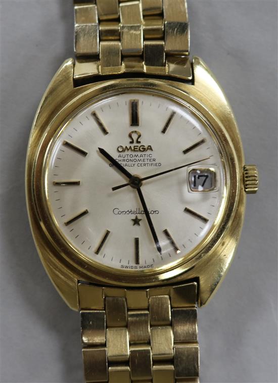 A gentlemans steel and gold plated Omega Constellation automatic wrist watch, on Omega bracelet.